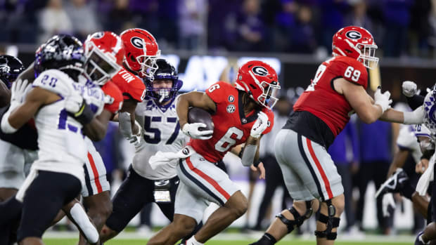Jan 9, 2023; Inglewood, CA, USA; Georgia Bulldogs running back Kenny McIntosh (6) against the TCU Horned Frogs during the CFP national championship game at SoFi Stadium. Mandatory Credit: Mark J. Rebilas-USA TODAY Sports