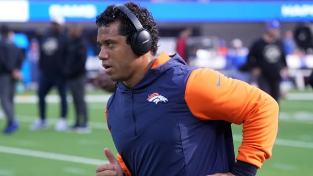 Denver Broncos quarterback Russell Wilson wears Bose headphones before the game against the Los Angeles Rams at SoFi Stadium.