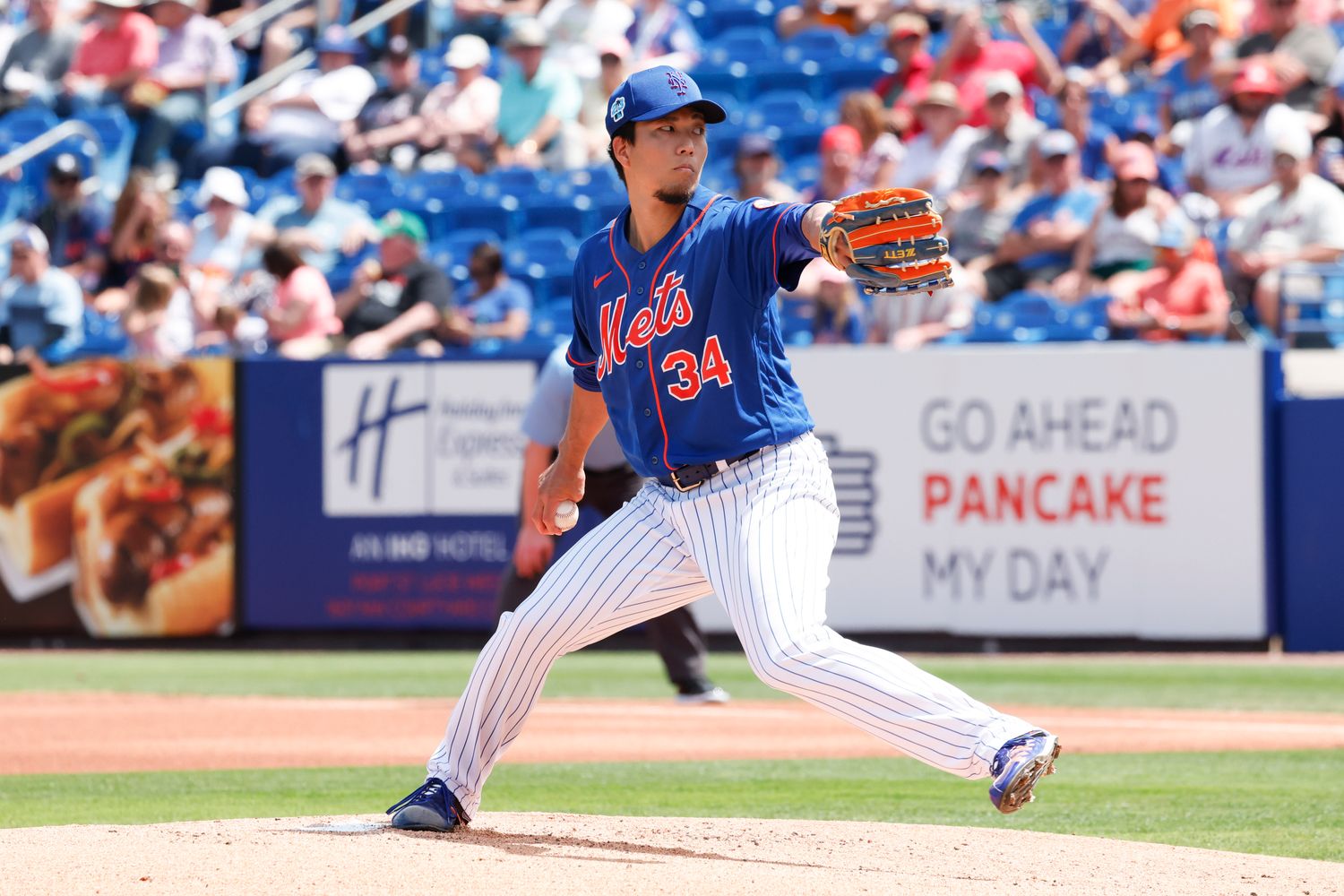 Mar 22, 2023; Port St. Lucie, Florida, USA; New York Mets starting pitcher Kodai Senga (34) throws a pitch during the first inning against the Houston Astros at Clover Park.