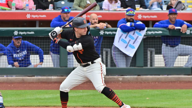 SF Giants DH Casey Schmitt at bat against the Texas Rangers during a Spring Training game. (2023)