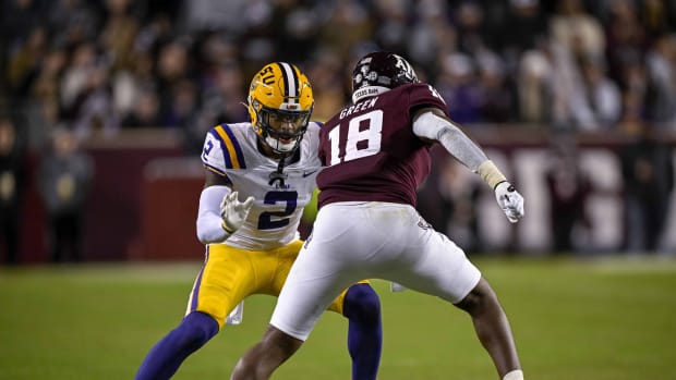 Nov 26, 2022; College Station, Texas, USA; LSU Tigers cornerback Mekhi Garner (2) and Texas A&M Aggies tight end Donovan Green (18) in action during the game between the Texas A&M Aggies and the LSU Tigers at Kyle Field. Mandatory Credit: Jerome Miron-USA TODAY Sports