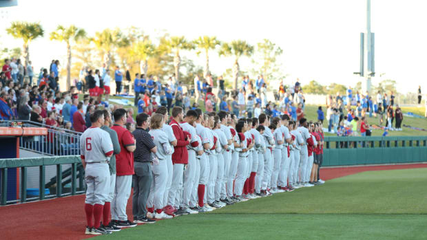 Alabama Baseball stands for the national anthem prior to its contest with the Florida Gators at Condron Family Ballpark in Gainesville, Fla.