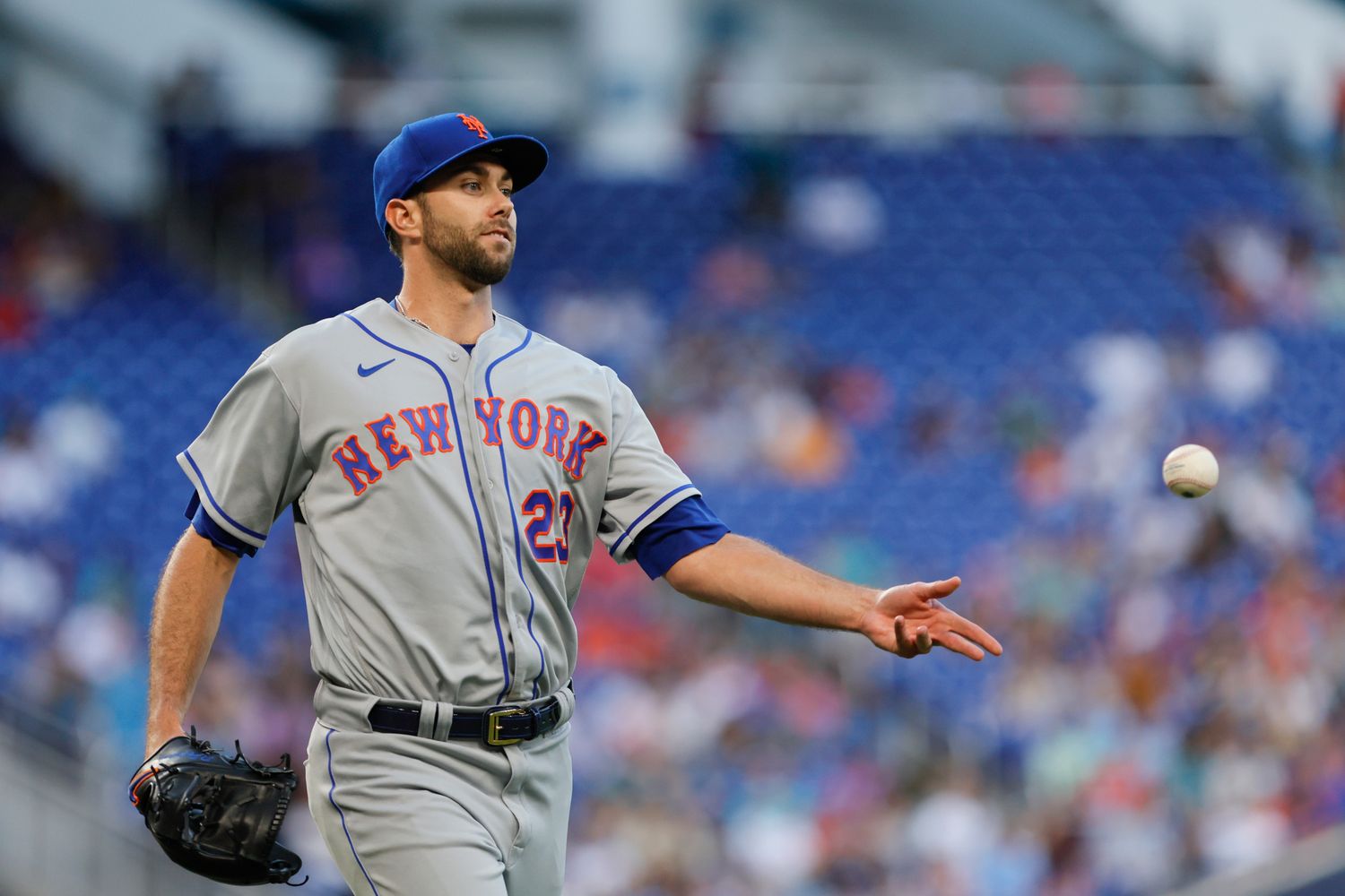 Mar 31, 2023; Miami, Florida, USA; New York Mets starting pitcher David Peterson (23) tosses the baseball to first baseman Pete Alonso (not pictured) to retire Miami Marlins center fielder Jazz Chisholm Jr. (not pictured) during the first inning at loanDepot Park.