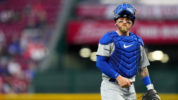 Chicago Cubs catcher Tucker Barnhart (18) walks back to home plate after a mound visit in the fourth inning of a baseball game between the Chicago Cubs and the Cincinnati Reds, Monday, April 3, 2023, at Great American Ball Park in Cincinnati. The Cincinnati Reds won, 7-6. Chicago Cubs At Cincinnati Reds April 3 0303