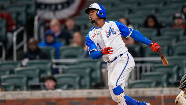 Apr 8, 2023; Cumberland, Georgia, USA; Atlanta Braves second baseman Ozzie Albies (1) watches his single hit against the San Diego Padres during the ninth inning at Truist Park.