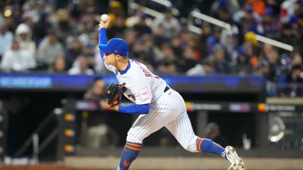 Apr 10, 2023; New York City, New York, USA; New York Mets pitcher David Robertson (30) delivers a pitch against the San Diego Padres during the eighth inning at Citi Field.