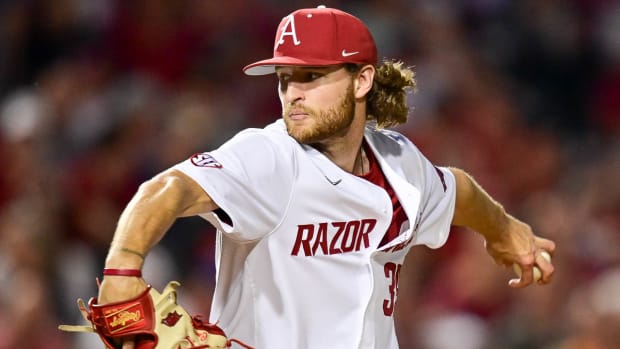 Razorbacks Hunter Hollan on the mound delivering a pitch against Tennessee on Friday night.