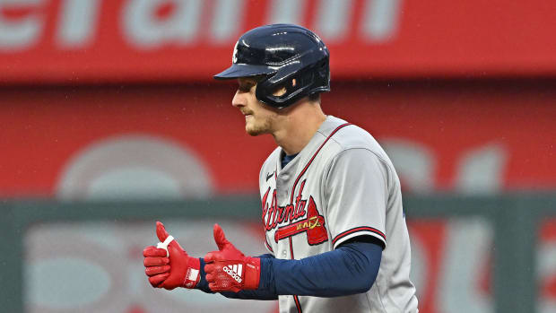 Apr 15, 2023; Kansas City, Missouri, USA; Atlanta Braves catcher Sean Murphy (12) reacts after hitting an RBI double during the first inning against the Kansas City Royals at Kauffman Stadium.