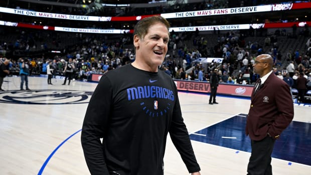 Dallas Mavericks owner Mark Cuban walks off the court