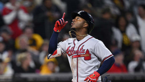Apr 18, 2023; San Diego, California, USA; Atlanta Braves second baseman Ozzie Albies (1) gestures while rounding the bases after hitting a three-run home run during the eighth inning against the San Diego Padres at Petco Park.