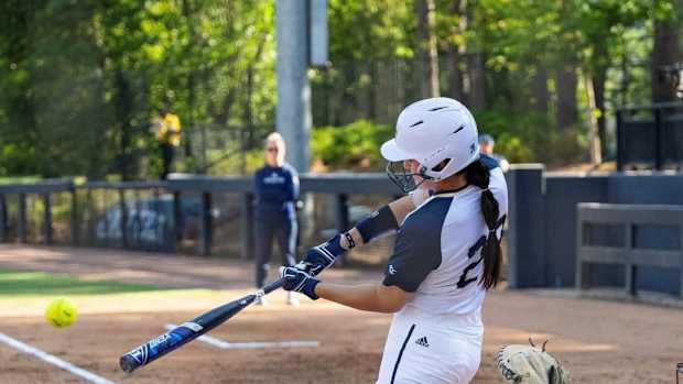 Minghini hitting a homerun