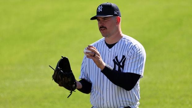 Yankees' Carlos Rodon will not throw for a few days due to back stiffness.