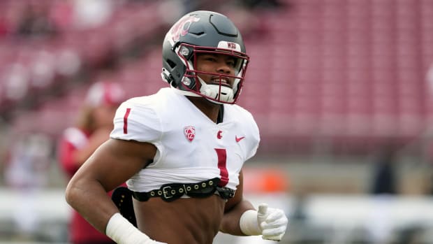 Nov 5, 2022; Stanford, California, USA; Washington State Cougars linebacker Daiyan Henley (1) warms up before the game against the Stanford Cardinal at Stanford Stadium.