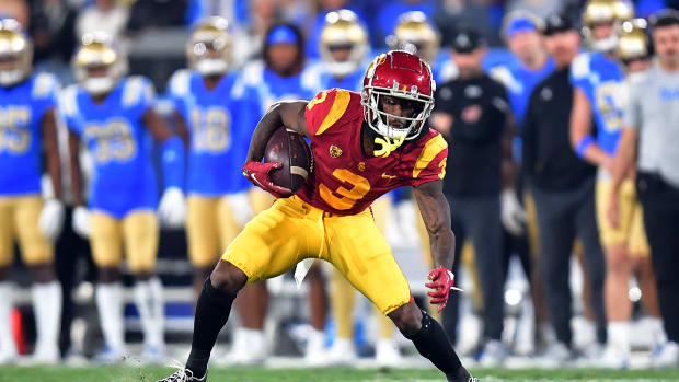 Nov 19, 2022; Pasadena, California, USA; Southern California Trojans wide receiver Jordan Addison (3) runs the ball against the UCLA Bruins during the first half at the Rose Bowl. Mandatory Credit: Gary A. Vasquez-USA TODAY Sports