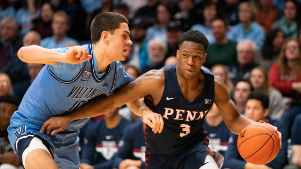 Dec 4, 2019; Villanova, PA, USA; Pennsylvania Quakers guard Jordan Dingle (3) drives the lane against Villanova Wildcats forward Cole Swider (10) during the second half at Finneran Pavilion. Mandatory Credit: Bill Streicher-USA TODAY Sports