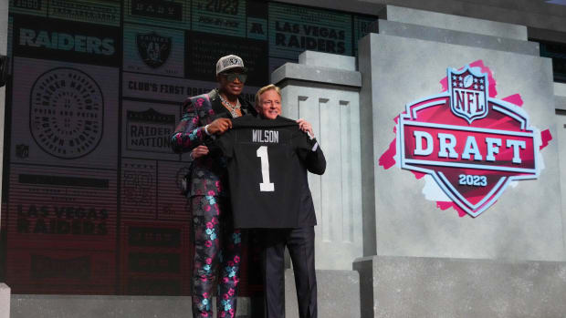 Texas Tech defensive end Tyree Wilson with NFL commissioner Roger Goodell after being selected by the Las Vegas Raiders seventh overall in the first round of the 2023 NFL Draft at Union Station.