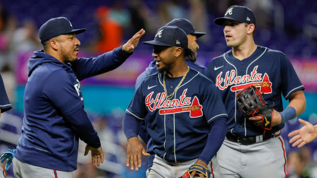 May 3, 2023; Miami, Florida, USA; Atlanta Braves second baseman Ozzie Albies (1) celebrates with teammates after winning the game against the Miami Marlins at loanDepot Park.