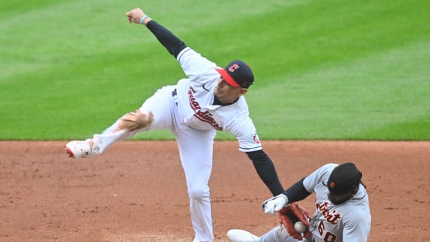 Andrés Giménez tags out Akil Baddoo attempting to steal second in the Tigers' 6-2 win Monday evening.