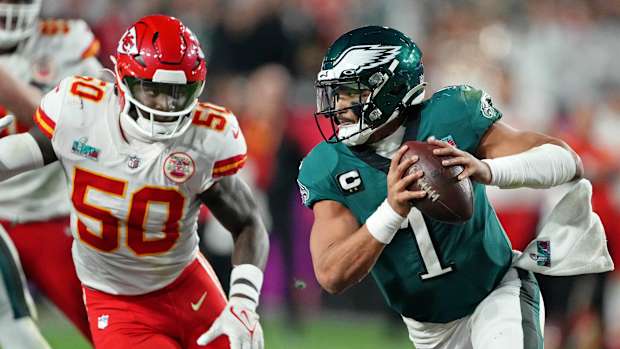 Willie Gay Jr. chases Jalen Hurts during Super Bowl LVII.