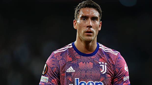 Striker Dušan Vlahović looks on during a game for Juventus.
