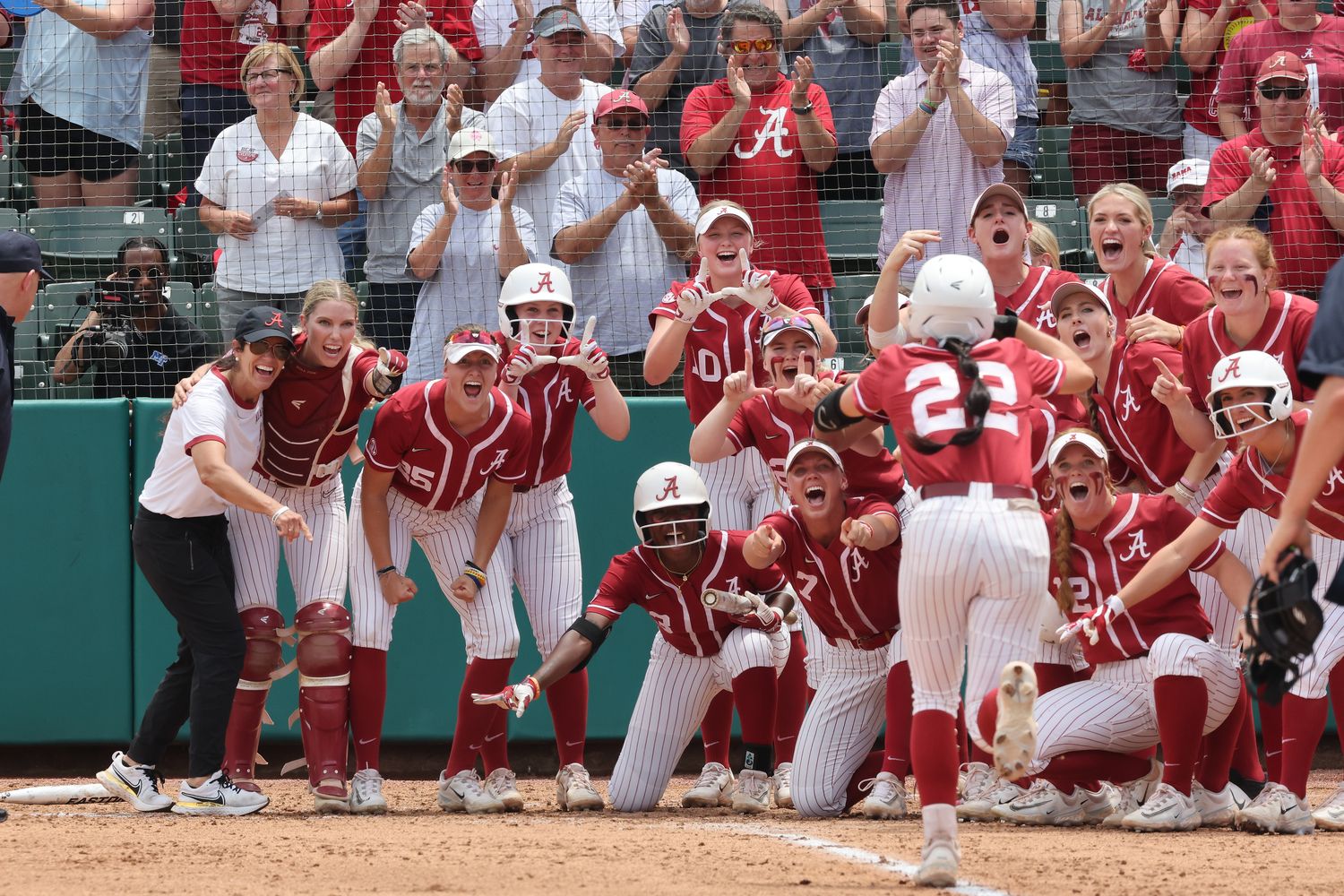 Alabama softball celebrates home run