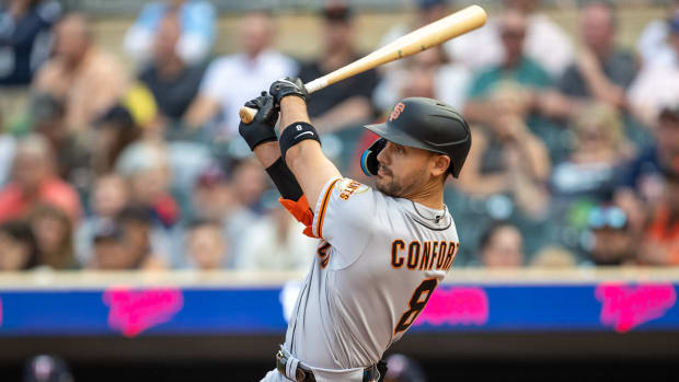 SF Giants outfielder Michael Conforto hits a three-run home run against the Minnesota Twins. (2023)