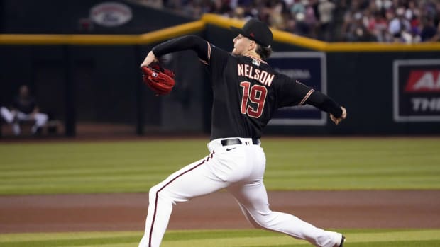 Ryne Nelson (19) throws a pitch against the Atlanta Braves at Chase Field.
