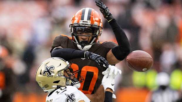 Greg Newsome II breaks up a pass.