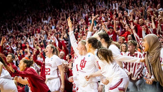 Indiana women's basketball bench and fans