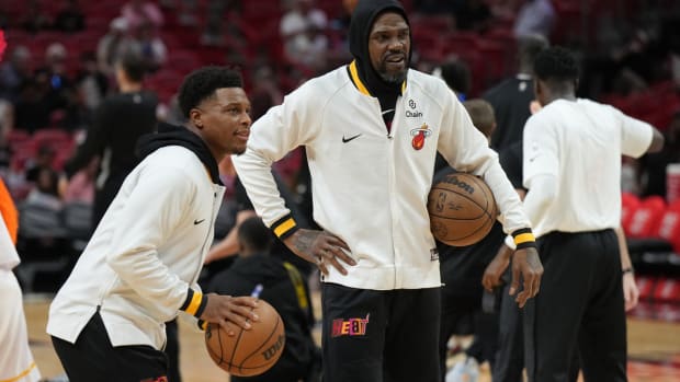 Dec 10, 2022; Miami, Florida, USA; Miami Heat guard Kyle Lowry (left) and forward Udonis Haslem (40) warm-up before the game against the San Antonio Spurs at FTX Arena. Mandatory Credit: Jim Rassol-USA TODAY Sports