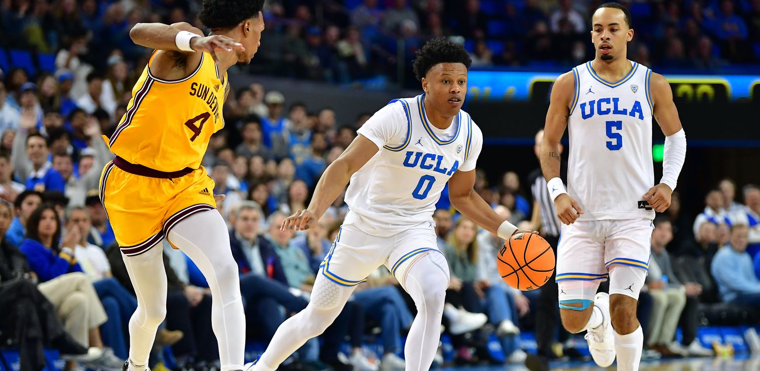 Mar 2, 2023; Los Angeles, California, USA; UCLA Bruins guard Jaylen Clark (0) moves the ball ahead of Arizona State Sun Devils guard Desmond Cambridge Jr. (4) during the second half at Pauley Pavilion.