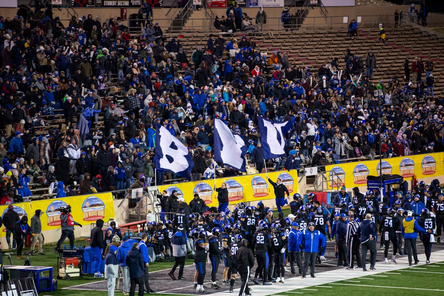 Dec 17, 2022; Albuquerque, New Mexico, USA; Brigham Young Cougars fans celebrate after a touchdown against the Southern Methodist Mustangs at University Stadium (Albuquerque).