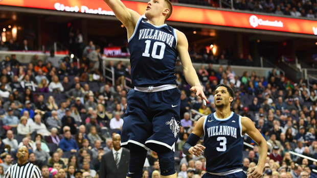 Mar 4, 2017; Washington, DC, USA; Villanova Wildcats guard Donte DiVincenzo (10) shoots a layup as guard Josh Hart (3) looks on against the Georgetown Hoyas during the first half at Verizon Center. Mandatory Credit: Brad Mills-USA TODAY Sports