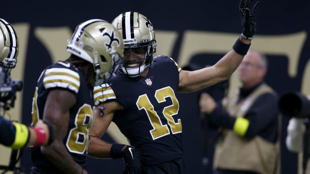 Chris Olave and Rashid Shaheed celebrate Olave's touchdown against the Los Angeles Rams.