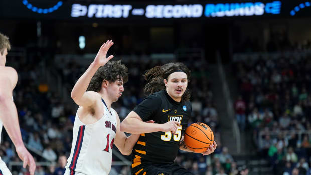 Mar 17, 2023; Albany, NY, USA; Virginia Commonwealth Rams forward David Shriver (35) controls the ball against St. Mary's Gaels forward Kyle Bowen (14) during the second half at MVP Arena. Mandatory Credit: David Butler II-USA TODAY Sports