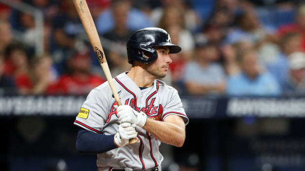 Jul 8, 2023; St. Petersburg, Florida, USA; Atlanta Braves first baseman Matt Olson (28) hits an rbi single against the Tampa Bay Rays in the fourth inning at Tropicana Field. Mandatory Credit: Nathan Ray Seebeck-USA TODAY Sports