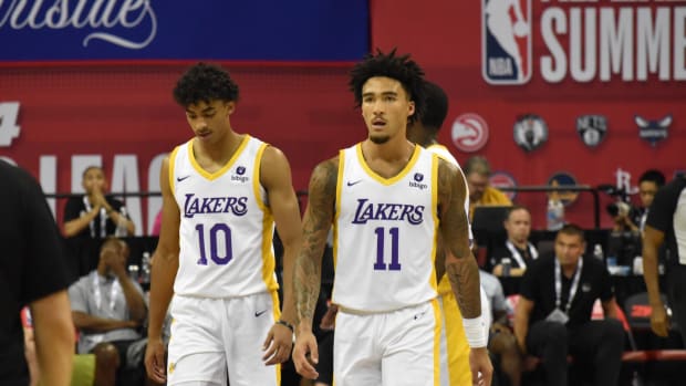 Max Christie (10) and Jalen Hood-Schifino (11) make their way back down the court after a foul was called sending Hood-Schifino to the line.