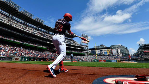 Jul 4, 2023; Washington, District of Columbia, USA; Washington Nationals right fielder Lane Thomas (28) warms up during the first inning against the Cincinnati Reds at Nationals Park.