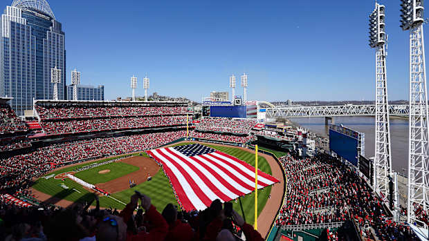 F-16 U.S. Air Force fighter jets fly over Great American Ball Park during the national anthem prior to a baseball game between the Pittsburgh Pirates and the Cincinnati Reds on Opening Day, Thursday, March 30, 2023, at Great American Ball Park in Cincinnati.