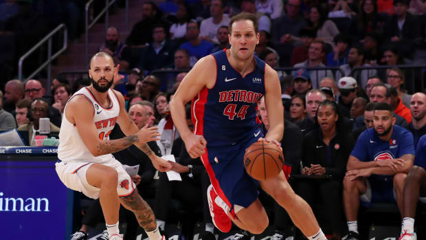 Oct 21, 2022; New York, New York, USA; Detroit Pistons forward Bojan Bogdanovic (44) moves the ball past New York Knicks guard Evan Fournier (13) during the second quarter at Madison Square Garden. Mandatory Credit: Tom Horak-USA TODAY Sports