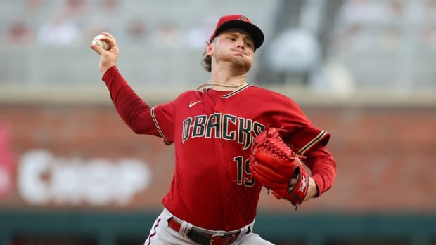 Ryne Nelson pitching against the Braves July 19, 2023
