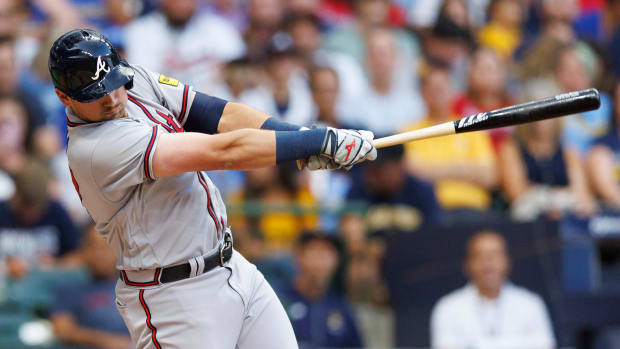 Jul 21, 2023; Milwaukee, Wisconsin, USA; Atlanta Braves third baseman Austin Riley (27) hits a home run during the third inning against the Milwaukee Brewers at American Family Field.