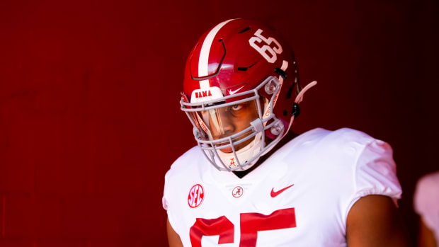 Sep 18, 2021; Gainesville, Florida, USA; Alabama Crimson Tide defensive lineman JC Latham (65) against the Florida Gators at Ben Hill Griffin Stadium.