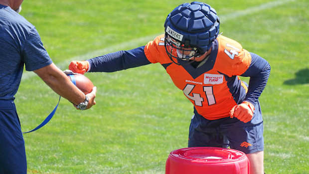 Former Razorback Drew Sanders on field at Denver Broncos training camp Saturday