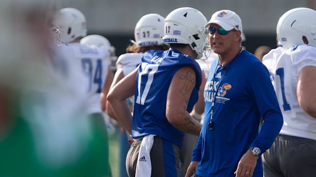 Kansas head coach Lance Leipold yells out as players move in to positions during Tuesday's outdoor practice.