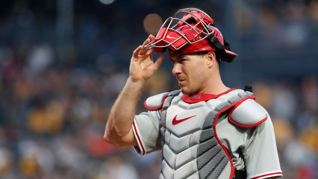 Jul 28, 2023; Pittsburgh, Pennsylvania, USA; Philadelphia Phillies catcher J.T. Realmuto (10) returns back behind the plate against the Pittsburgh Pirates during the fifth inning at PNC Park. Mandatory Credit: Charles LeClaire-USA TODAY Sports
