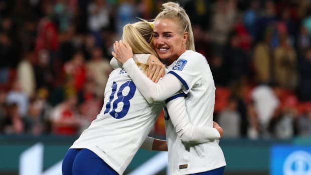 England celebrates a PK shootout win