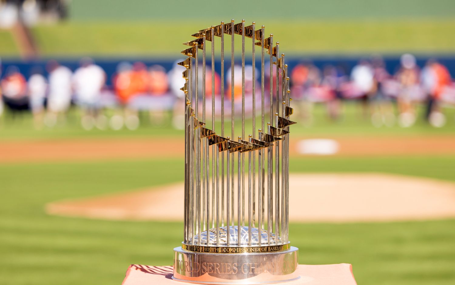 Feb 25, 2023; West Palm Beach, Florida, USA; The World Series trophy sits atop home plate prior to the game between the New York Mets and the Houston Astros at The Ballpark of the Palm Beaches.