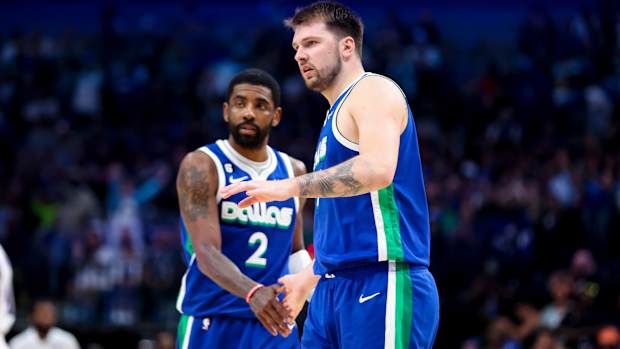 Dallas Mavericks guard Luka Doncic and Dallas Mavericks guard Kyrie Irving.