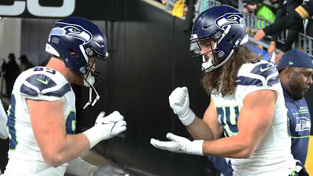NFL: Seattle Seahawks at Pittsburgh Steelers Oct 17, 2021; Pittsburgh, Pennsylvania, USA; Seattle Seahawks tight ends Will Dissly (89) and Colby Parkinson (84) play rock paper scissors as part of their pre-game routine before the game against the Pittsburgh Steelers at Heinz Field.
